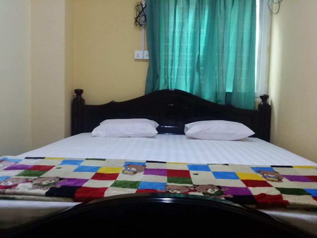 T Venus Hostel Γιανγκόν Δωμάτιο φωτογραφία